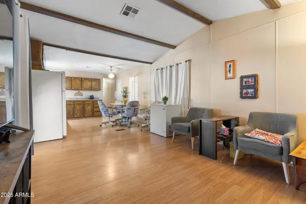a kitchen with a stove top oven sink and cabinets