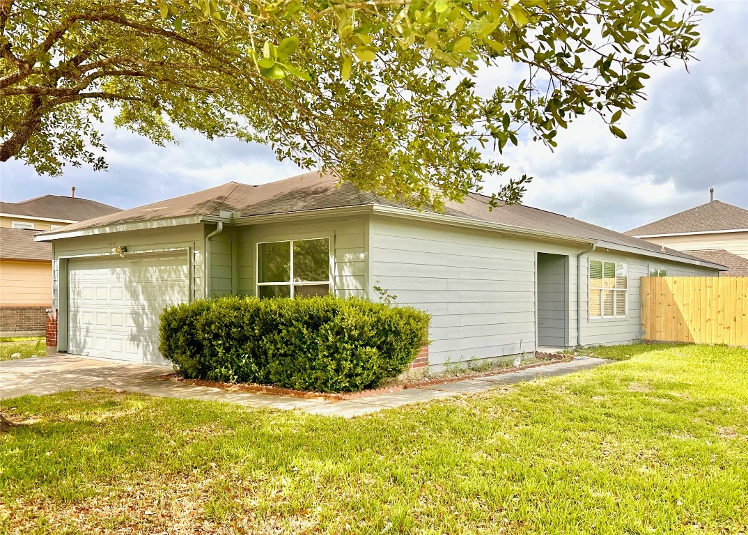 a view of a house with pool and garden