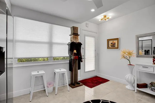 a room with furniture and a window