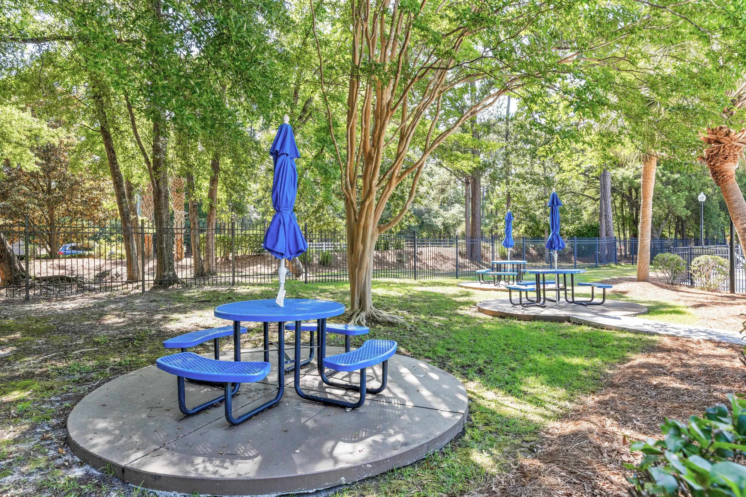 4566 Fringetree Drive Murrells Inlet, SC 29576 - Photo 30 of 36 View of green lawn with golf course view and view of scattered trees