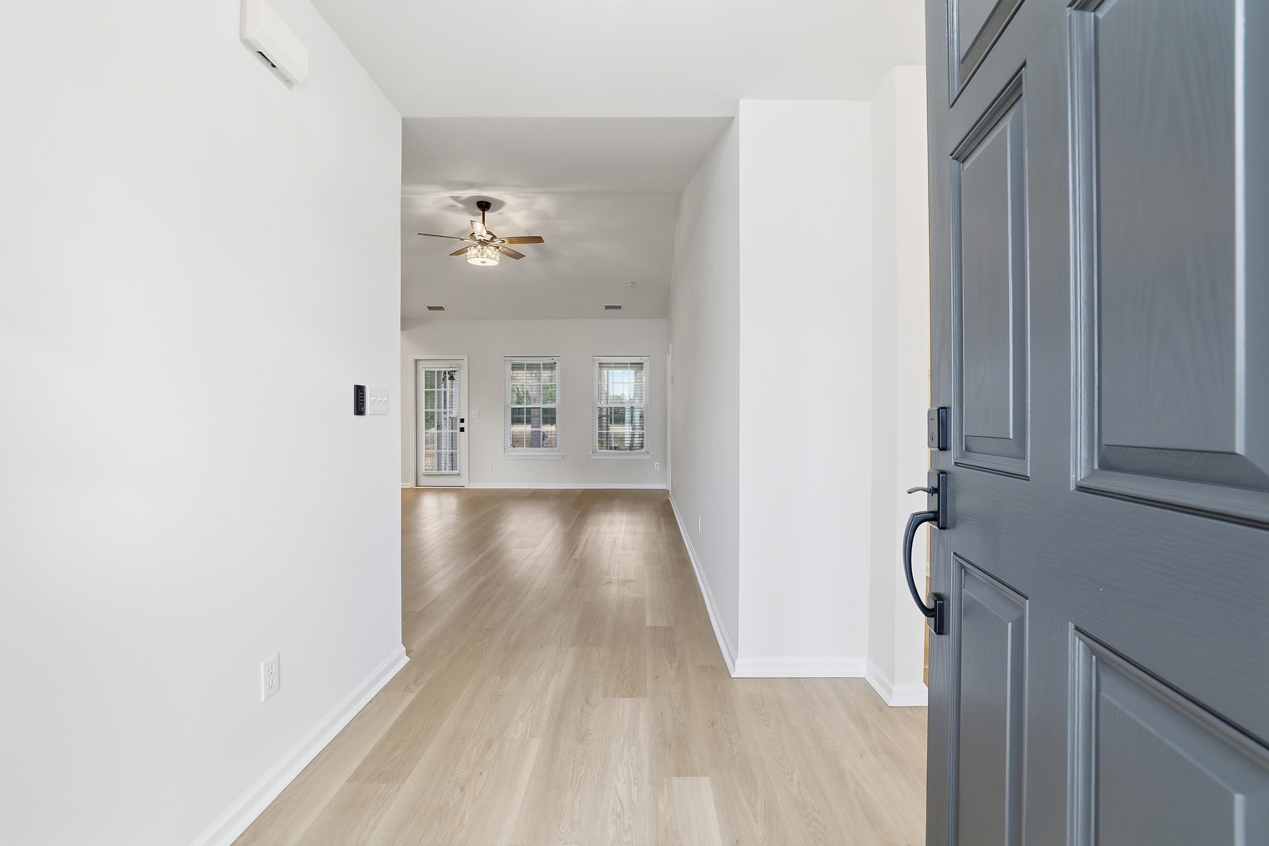 4566 Fringetree Drive Murrells Inlet, SC 29576 - Photo 4 of 36 Entrance foyer featuring light wood-type flooring and ceiling fan