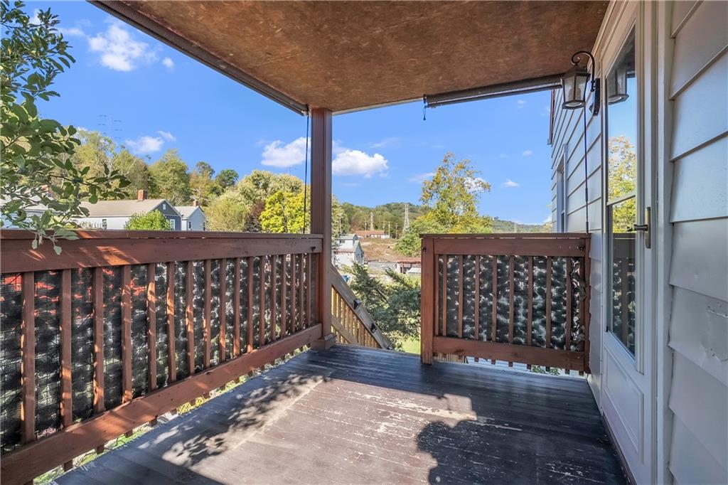 1229 McKee Road Crescent, PA 15046 - Photo 25 of 32 a view of a porch with wooden floor