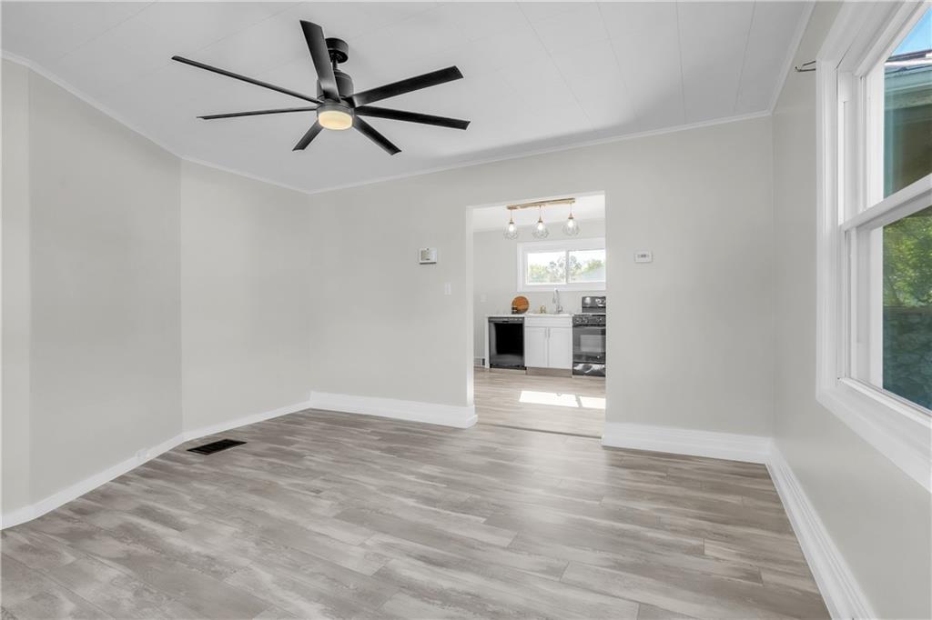 1229 McKee Road Crescent, PA 15046 - Photo 9 of 32 a view of empty room with wooden floor and fan