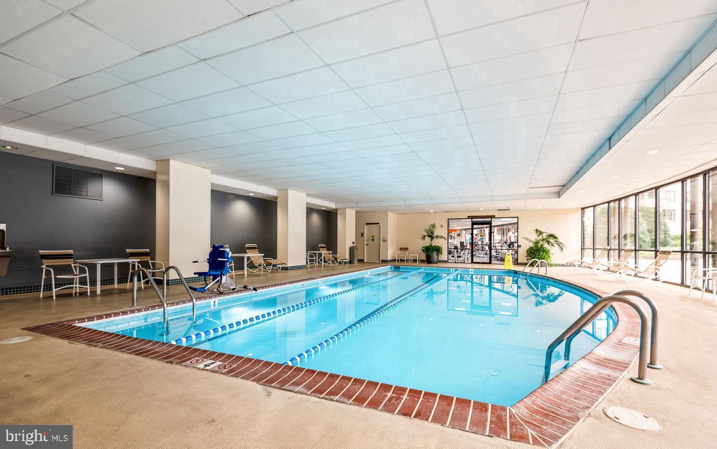 5225 Pooks Hill Road, Unit 303S Bethesda, MD 20814 - Photo 19 of 19 Indoor oasis with a serene pool.