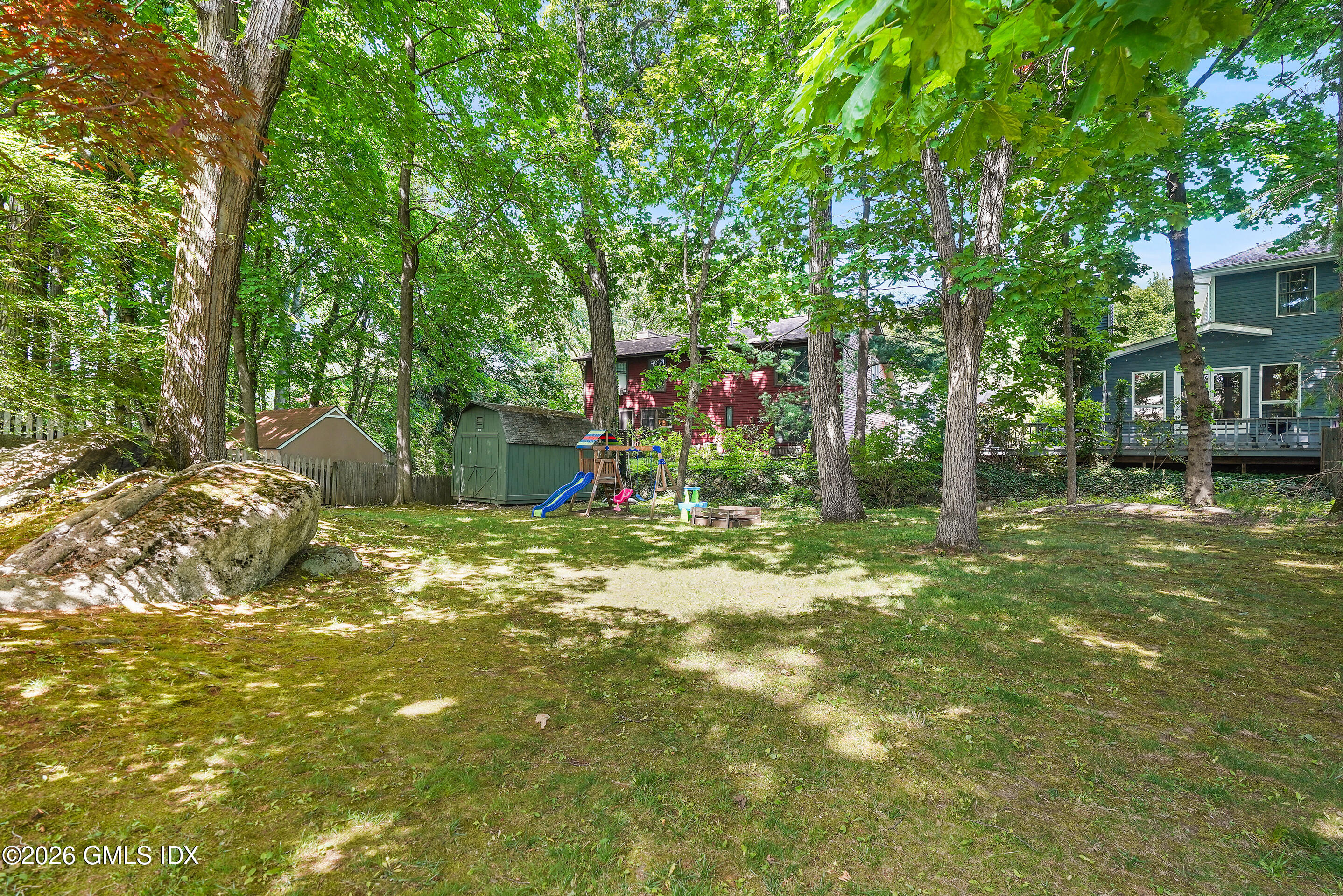 33 Sachem Road Greenwich, CT 06830 - Photo 28 of 35 a view of outdoor space with deck and tree