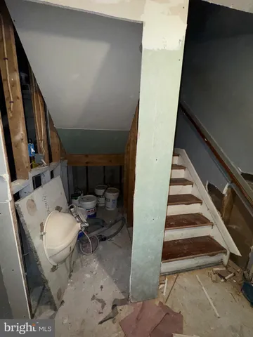 a bathroom with a sink and toilet