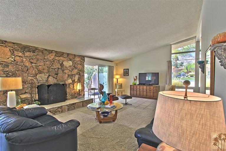 71586 Biskra Road Rancho Mirage, CA 92270 - Photo 3 of 25 a living room with furniture and a fireplace