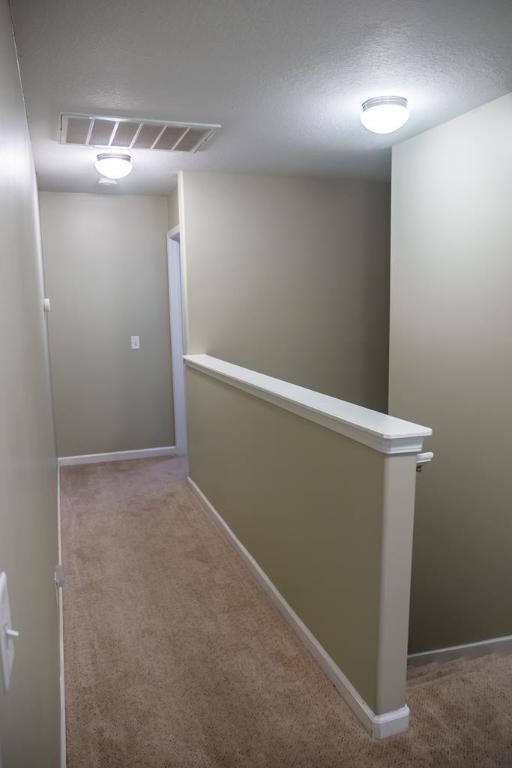 111 Covington Pointe Drive Brunswick, GA 31523 - Photo 23 of 29 Upstairs hallway