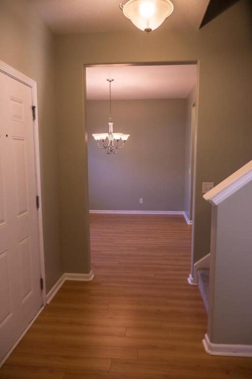 111 Covington Pointe Drive Brunswick, GA 31523 - Photo 6 of 29 Foyer leading into formal dining area.
