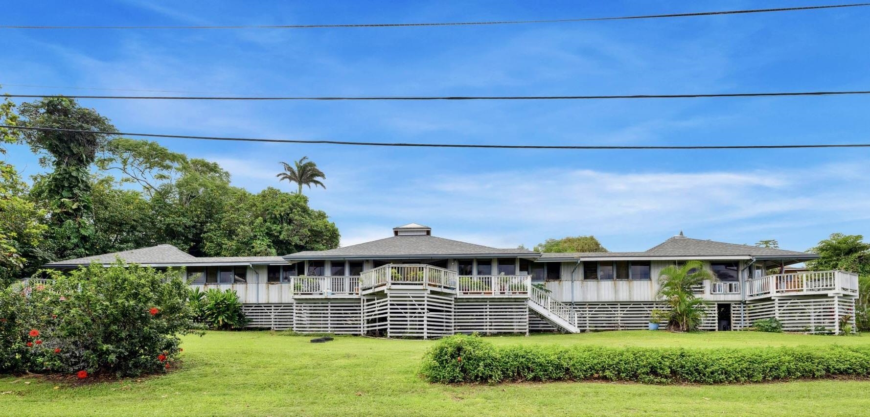 4950 Uakea Road Hana, HI 96713 - Photo 1 of 39 a front view of a house with a yard