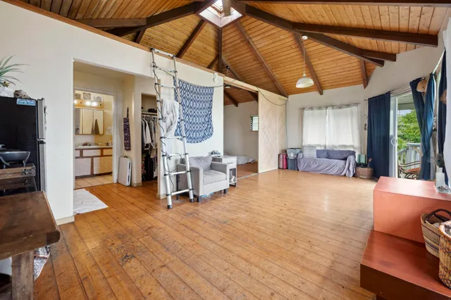a view of livingroom with furniture and floor to ceiling window