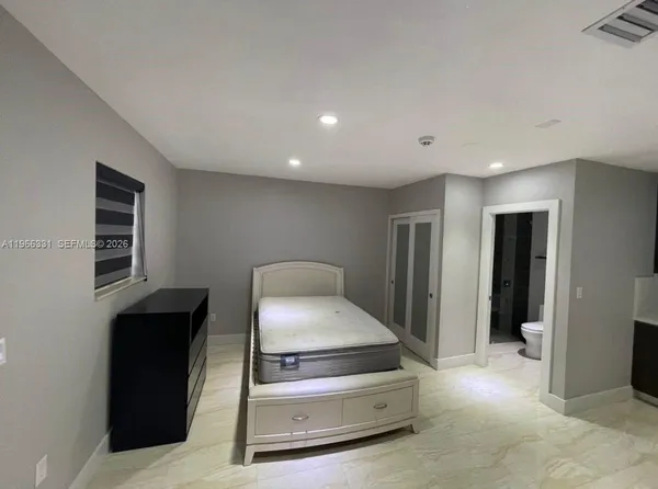 a room with furniture and closet