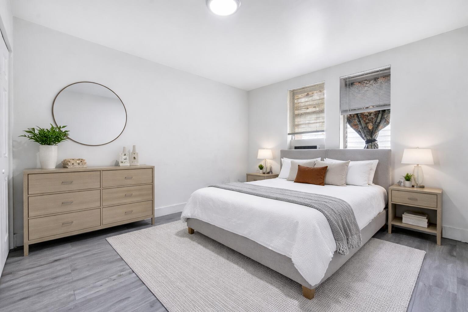 1554 Southwest 5th Street, Unit 5B Miami, FL 33135 - Photo 1 of 13 a bedroom with a bed and a dresser