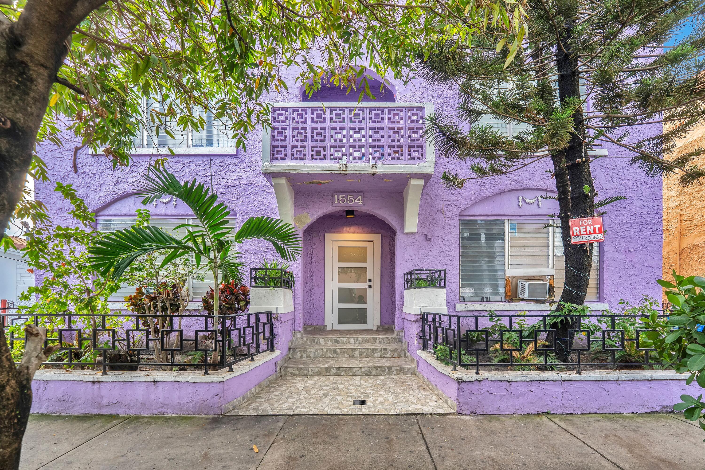 1554 Southwest 5th Street, Unit 5B Miami, FL 33135 - Photo 2 of 13 a front view of a multi story residential apartment buildings