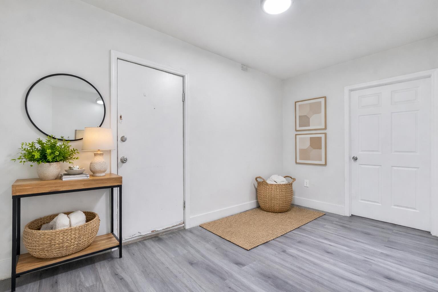 1554 Southwest 5th Street, Unit 5B Miami, FL 33135 - Photo 4 of 13 a living room with furniture and a potted plant