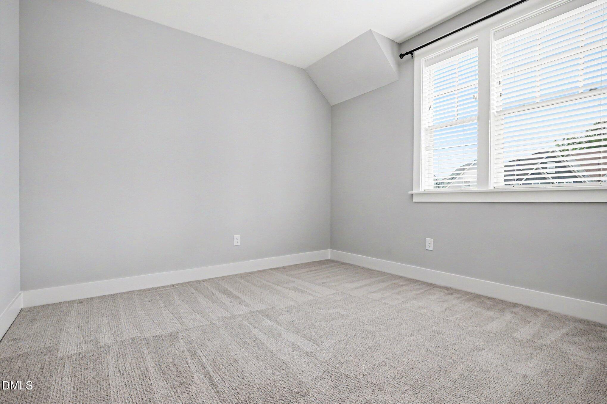 824 Watercolor Way Durham, NC 27713 - Photo 17 of 28 an empty room with a window