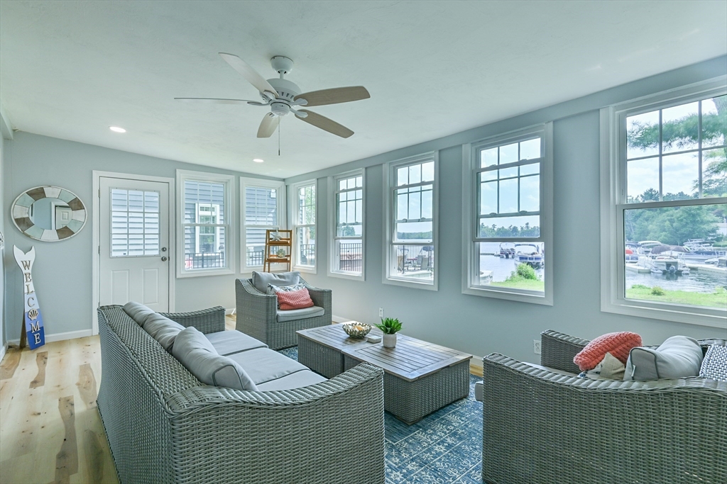 23 Lakeview Road Webster, MA 01570 - Photo 20 of 35 a living room with furniture and a window