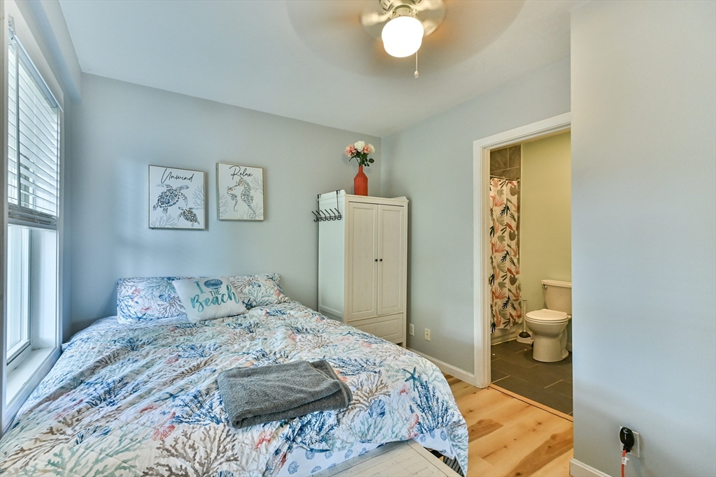 23 Lakeview Road Webster, MA 01570 - Photo 34 of 35 a bedroom with a bed and a window