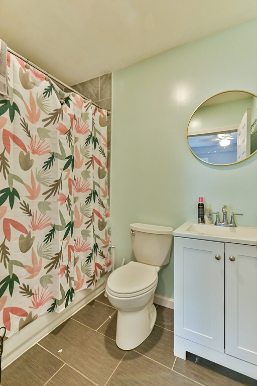 23 Lakeview Road Webster, MA 01570 - Photo 35 of 35 a bathroom with a toilet and a mirror