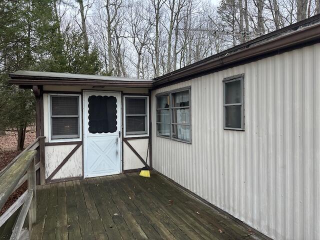 134 Maple Drive Cresco, PA 18326 - Photo 3 of 13 a house with trees in front of it