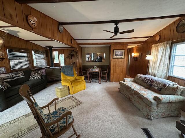 134 Maple Drive Cresco, PA 18326 - Photo 5 of 13 a living room with furniture and a chandelier