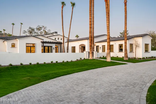 a front view of a house with a porch