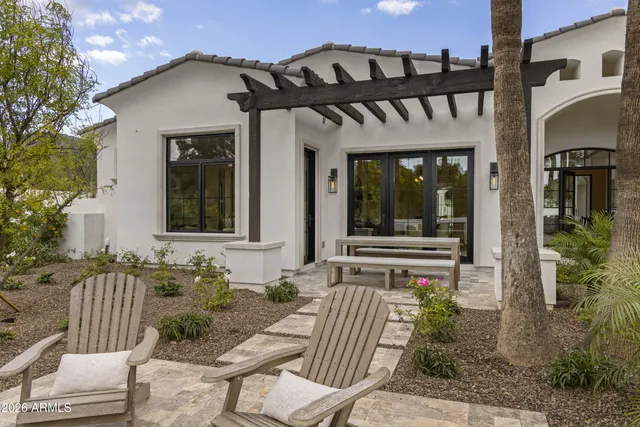 a view of a swimming pool with a patio