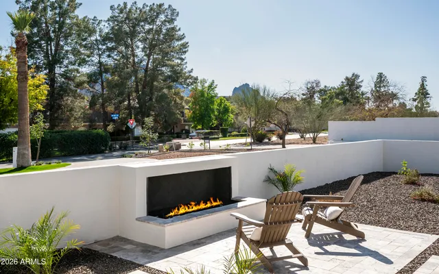 a front view of a house with swimming pool