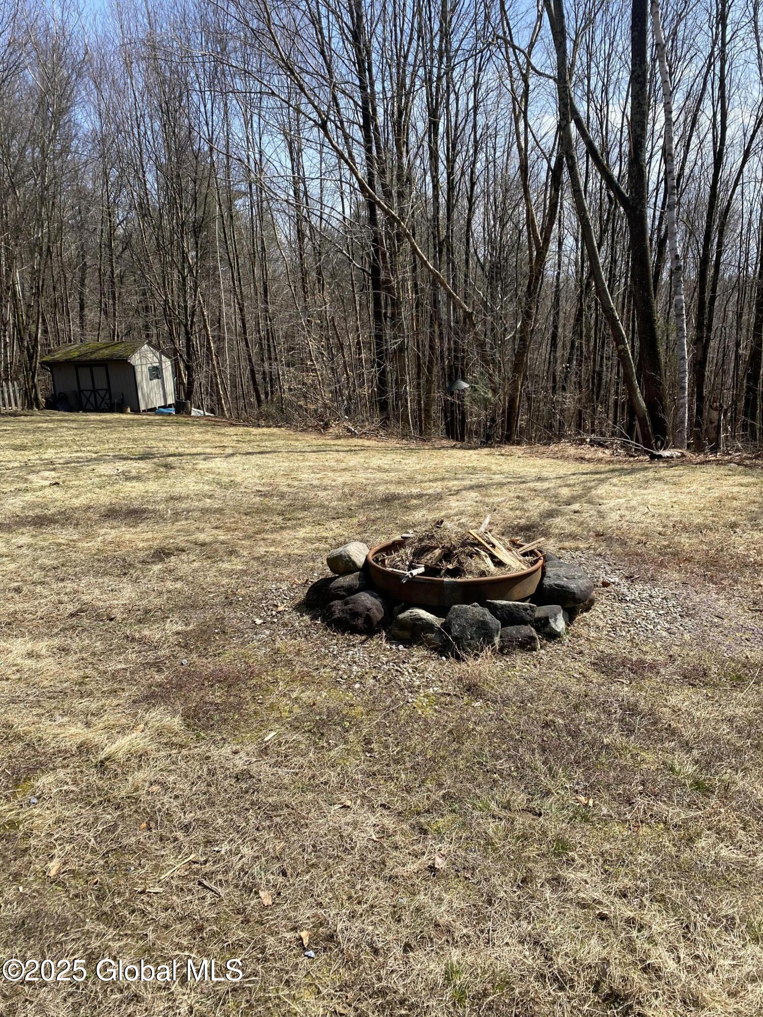 177 Hinds Road Providence, NY 12074 - Photo 53 of 63 fire pit