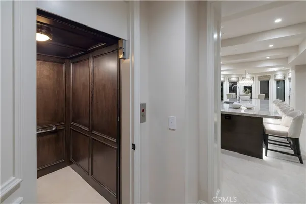 a bathroom with a shower sink and mirror