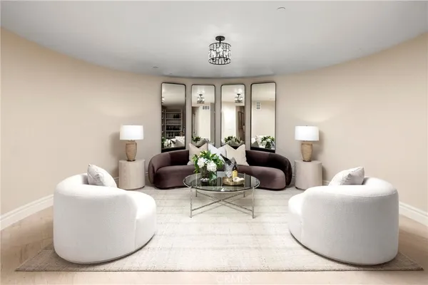 a lobby with a couch and a rug