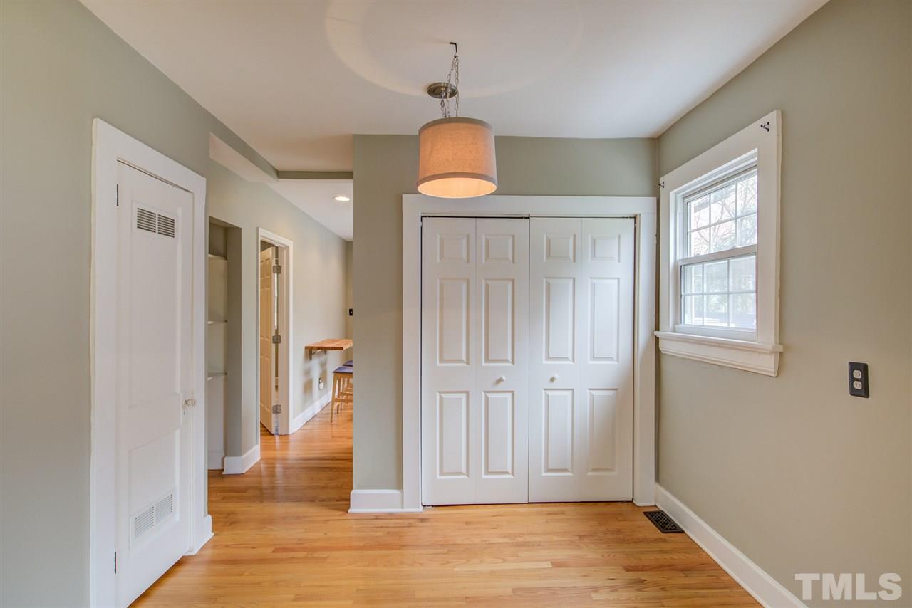 119 South Pettigrew Street Raleigh, NC 27610 - Photo 6 of 30 a view of a room with wooden floor closet and windows