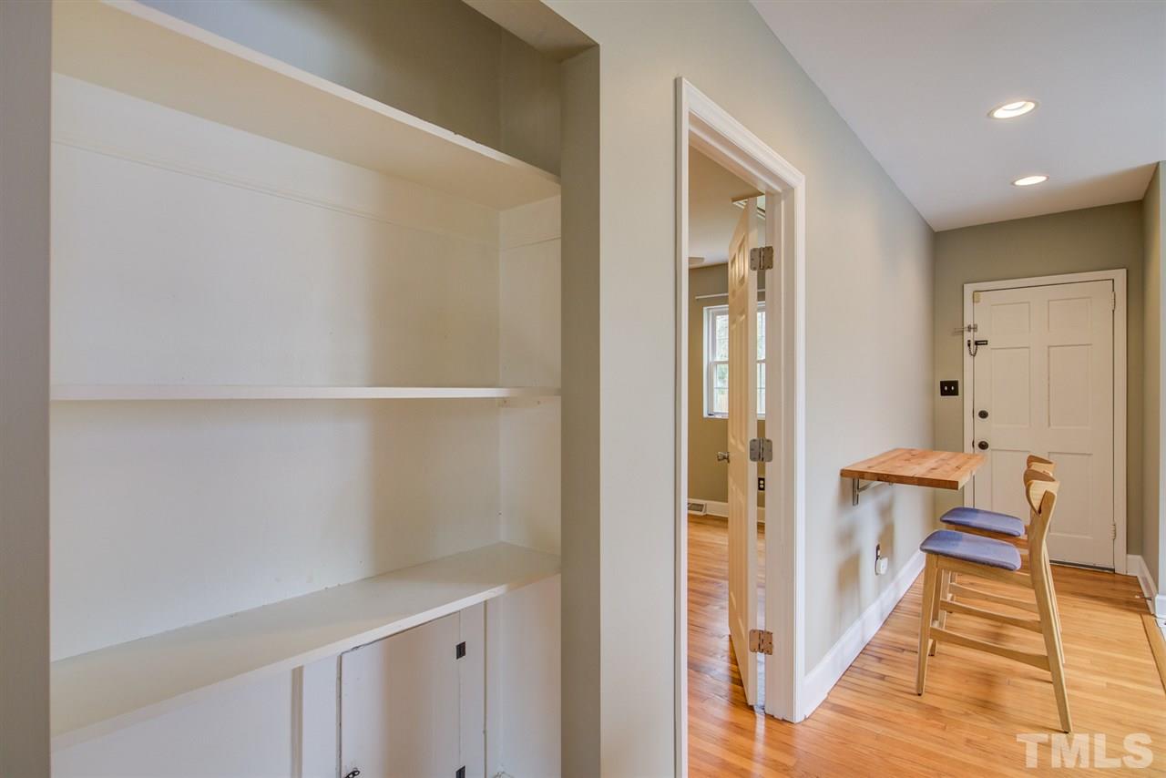 119 South Pettigrew Street Raleigh, NC 27610 - Photo 7 of 30 a view of a hallway with furniture and a entryway
