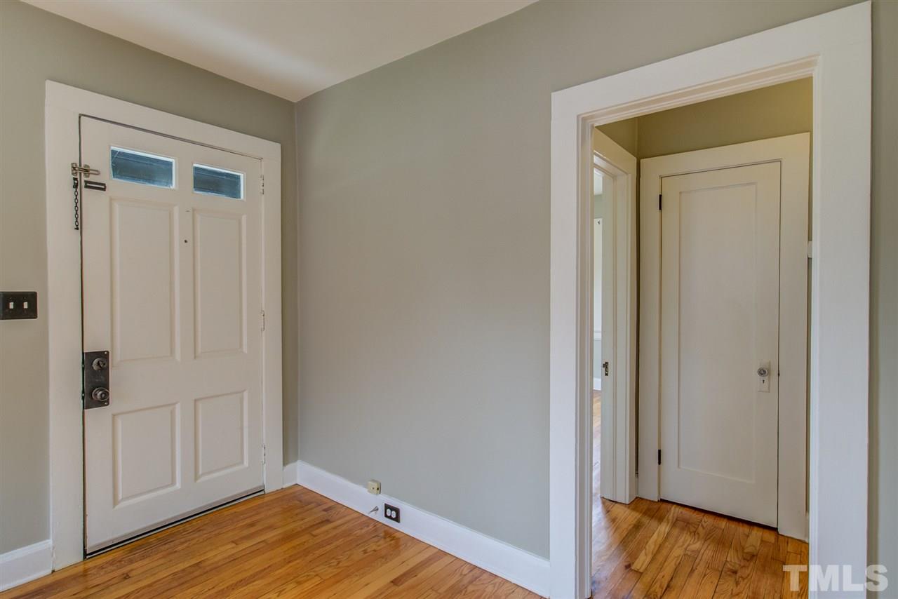 119 South Pettigrew Street Raleigh, NC 27610 - Photo 9 of 30 a view of a room with wooden floor and closet