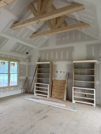 a view of an empty room with empty racks