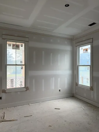 an empty room with windows