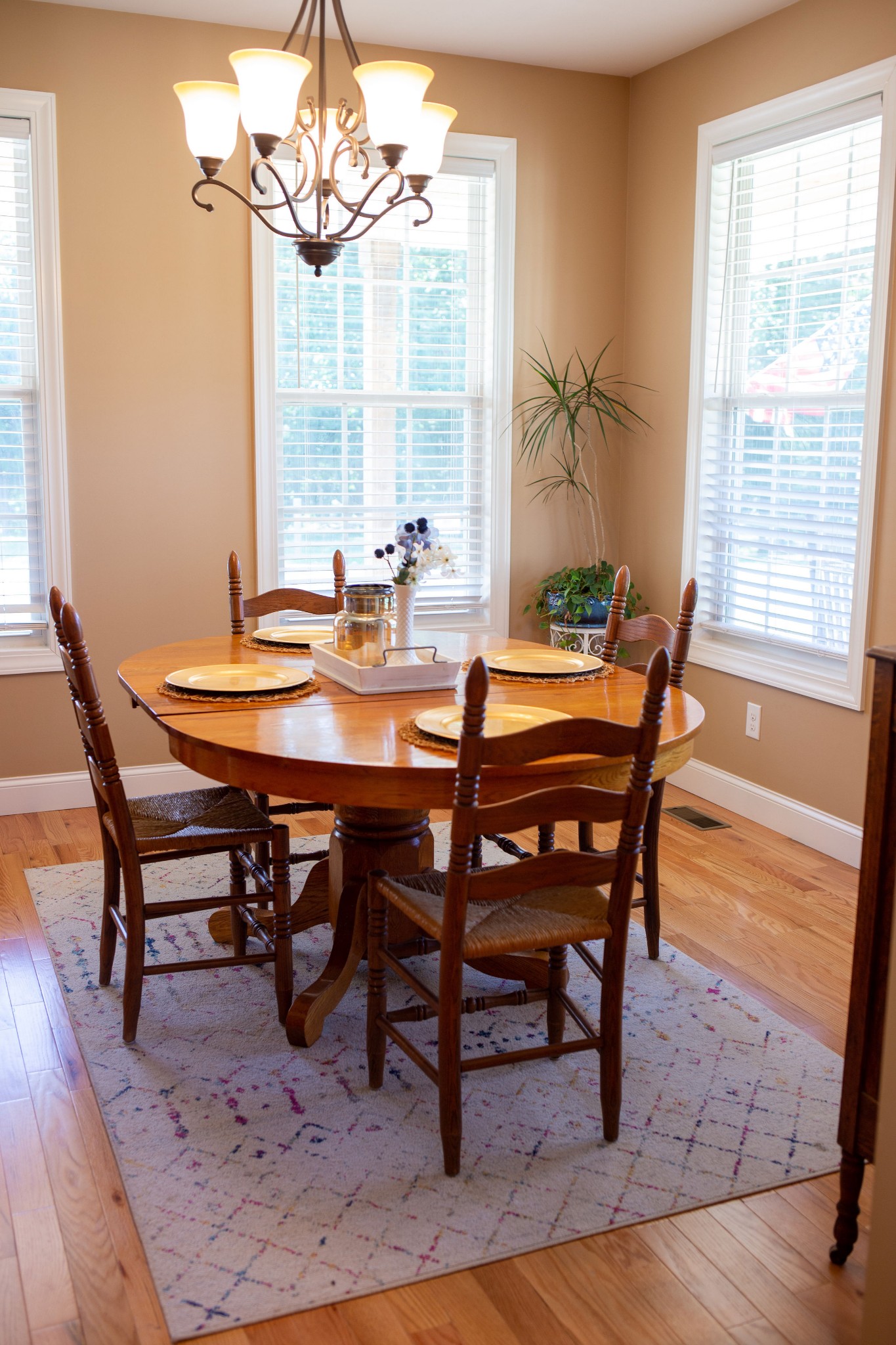 310 Freeland Road Portland, TN 37148 - Photo 19 of 31 a dining room with furniture a rug and a chandelier