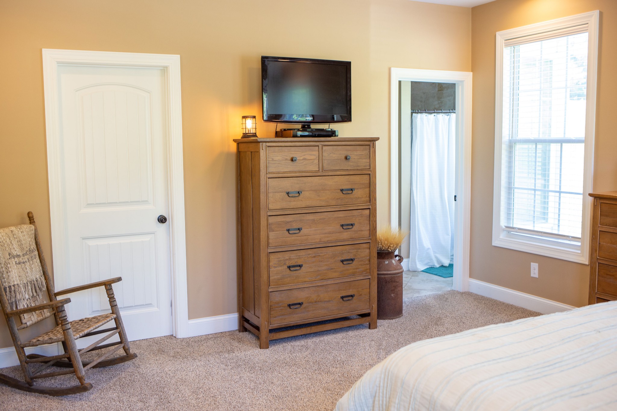 310 Freeland Road Portland, TN 37148 - Photo 30 of 31 a bedroom with a chair and flat screen television