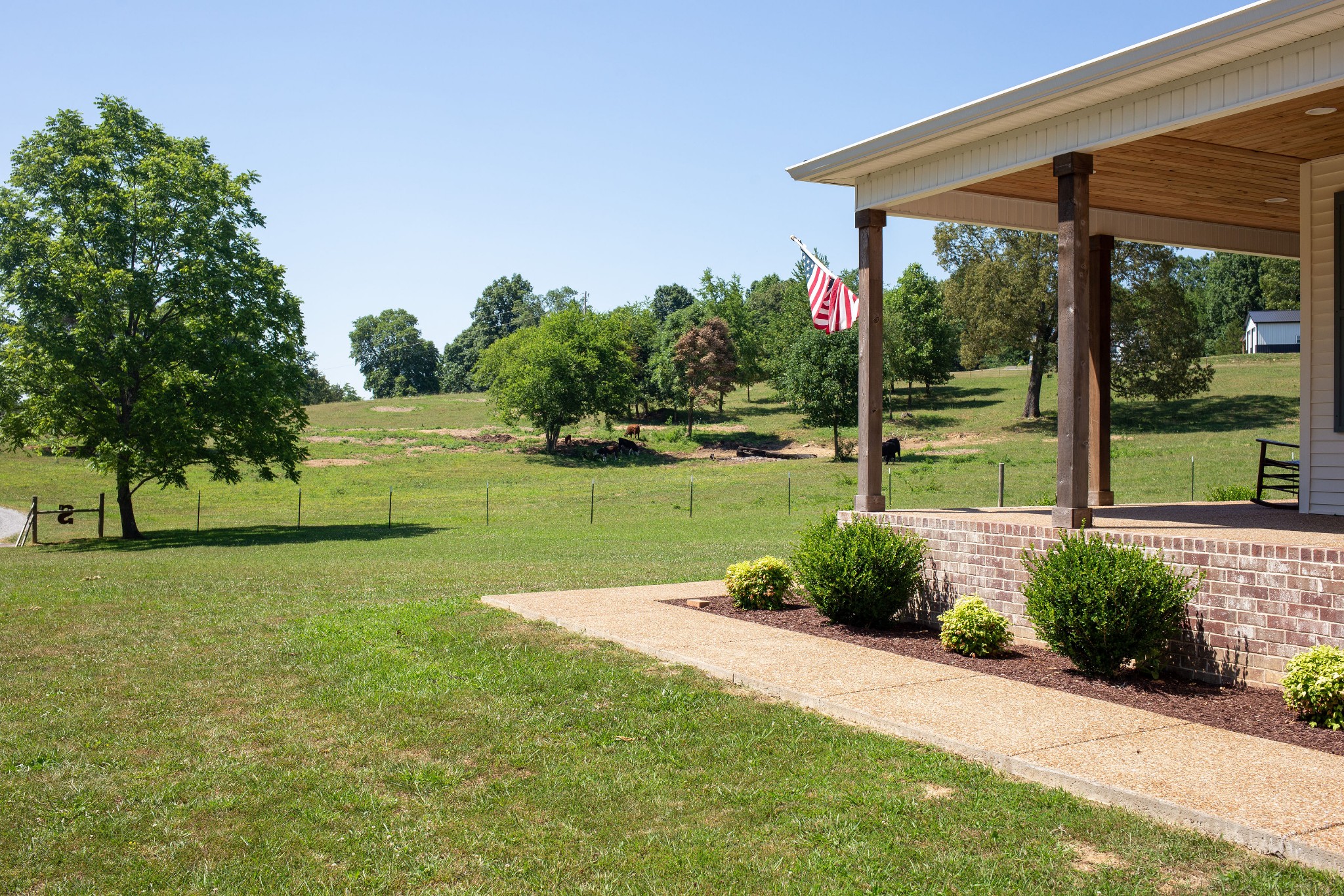 310 Freeland Road Portland, TN 37148 - Photo 8 of 31 a view of a backyard with a garden and plants