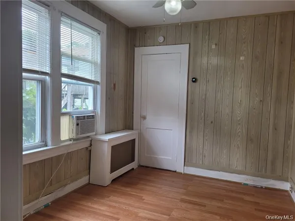 a room that has a bed and a window