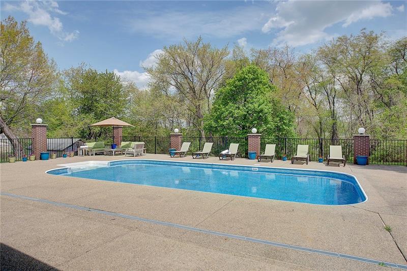1094 Silver Lane McKees Rocks, PA 15136 - Photo 22 of 25 The inground pool area is great for entertaining.
