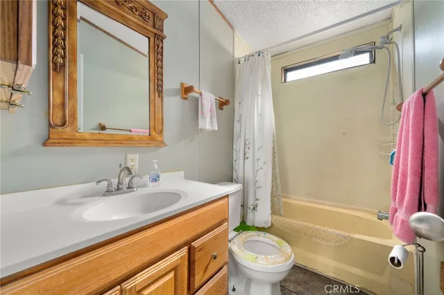 a blue bed sitting in a room