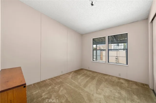 a view of livingroom with furniture and window