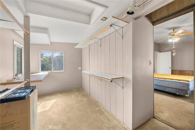 a view of a house with a backyard and balcony