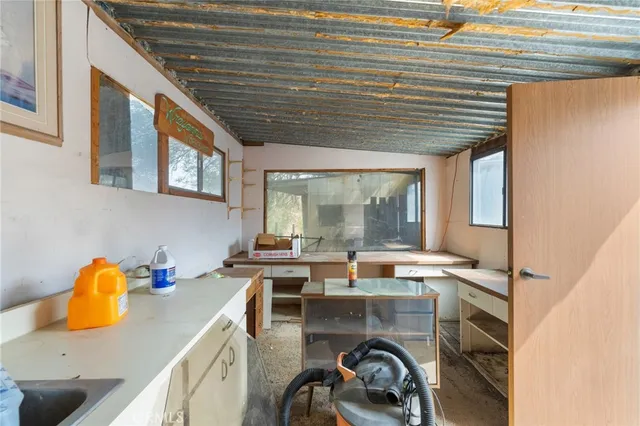 a kitchen with a stove and a microwave