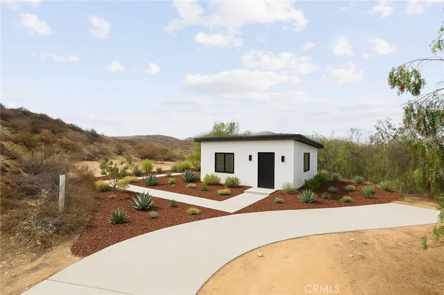 a view of ocean and mountains
