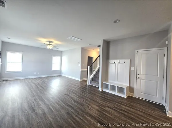 a view of entryway with wooden floor