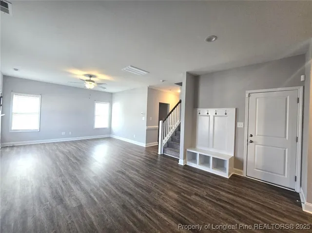 a view of entryway with wooden floor
