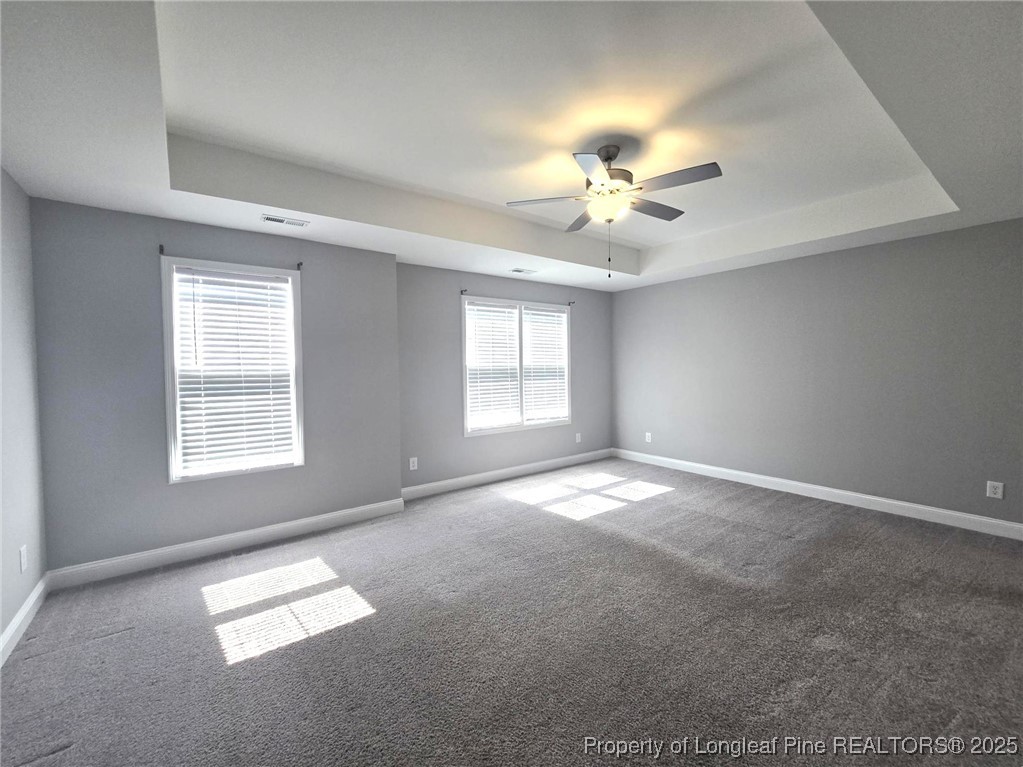 604 Amusement Drive Hope Mills, NC 28348 - Photo 21 of 41 a view of an empty room with a window