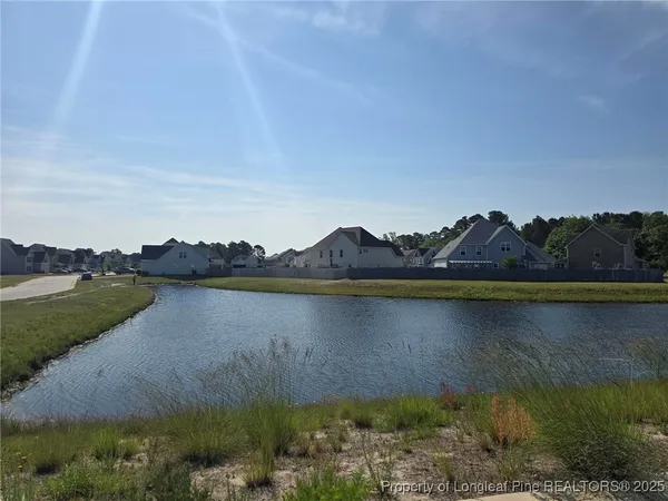a view of a lake from a yard